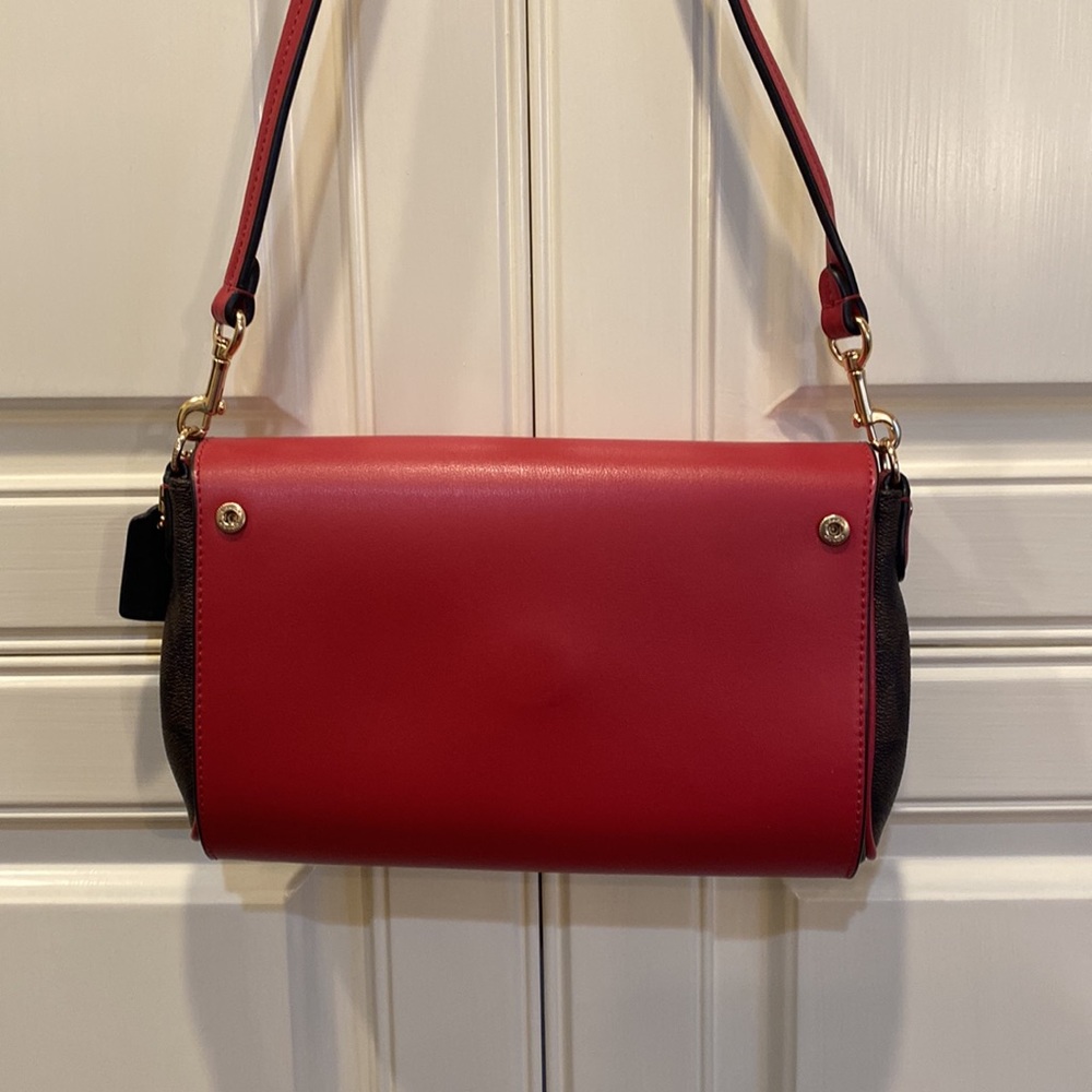 This is a like new coach cross body bag. - Picture 6 of 9